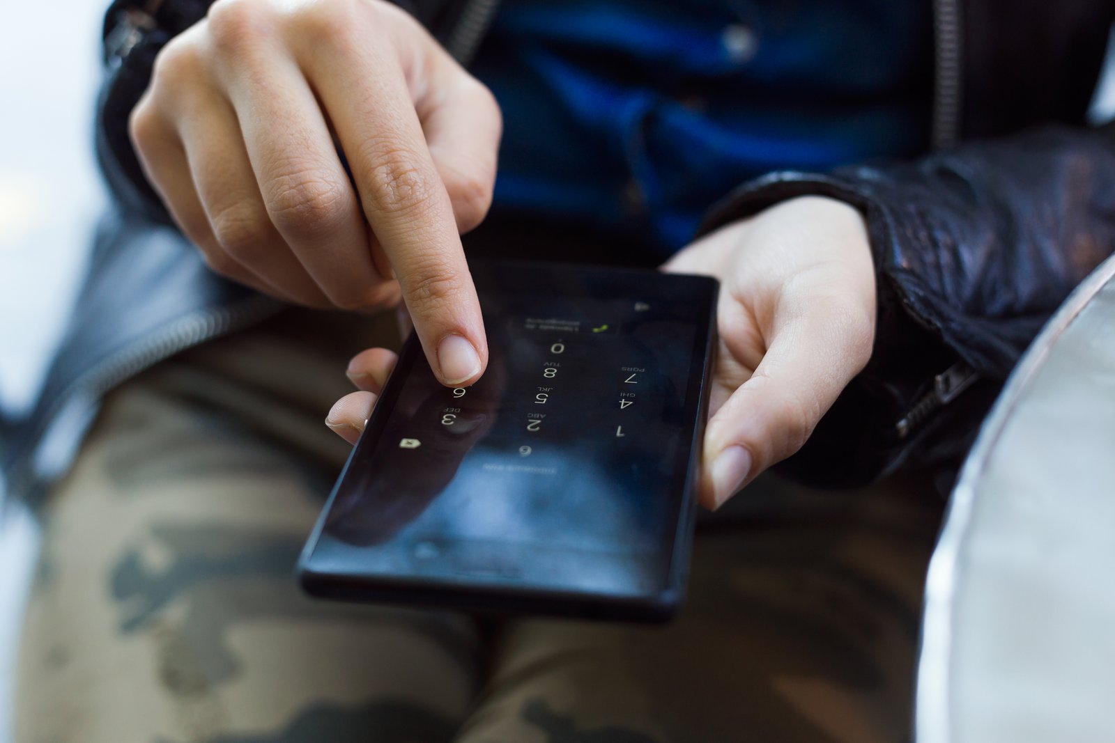 Person browsing a premium smartphone